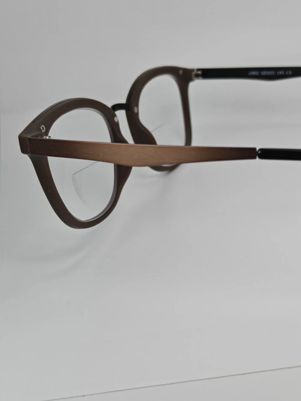 Lyric. Mocha Bronze Round Eyeglass Frames.